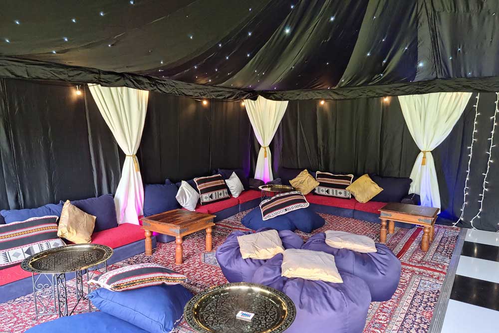 Starcloth Lining with Colourful Low-Level Seating Cushions.